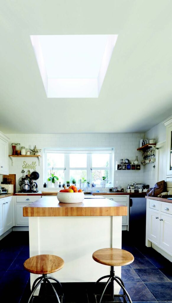 Flat skylight above kitchen island - Integra Windows